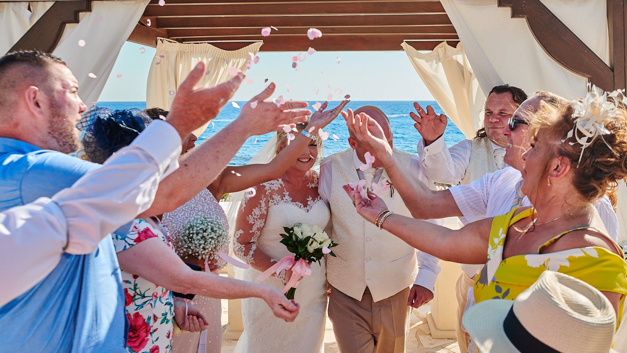 Wedding photography of Kara and Ian taken at The Sentido Cypria Bay, in Pafos, Cyprus by Richard King. September 2018. The wedding included a trip on a wedding bus. Wedding photography of Kara and Ian taken at The Sentido Cypria Bay, in Pafos, Cyprus by Richard King. September 2018. The wedding included a trip on a wedding bus.