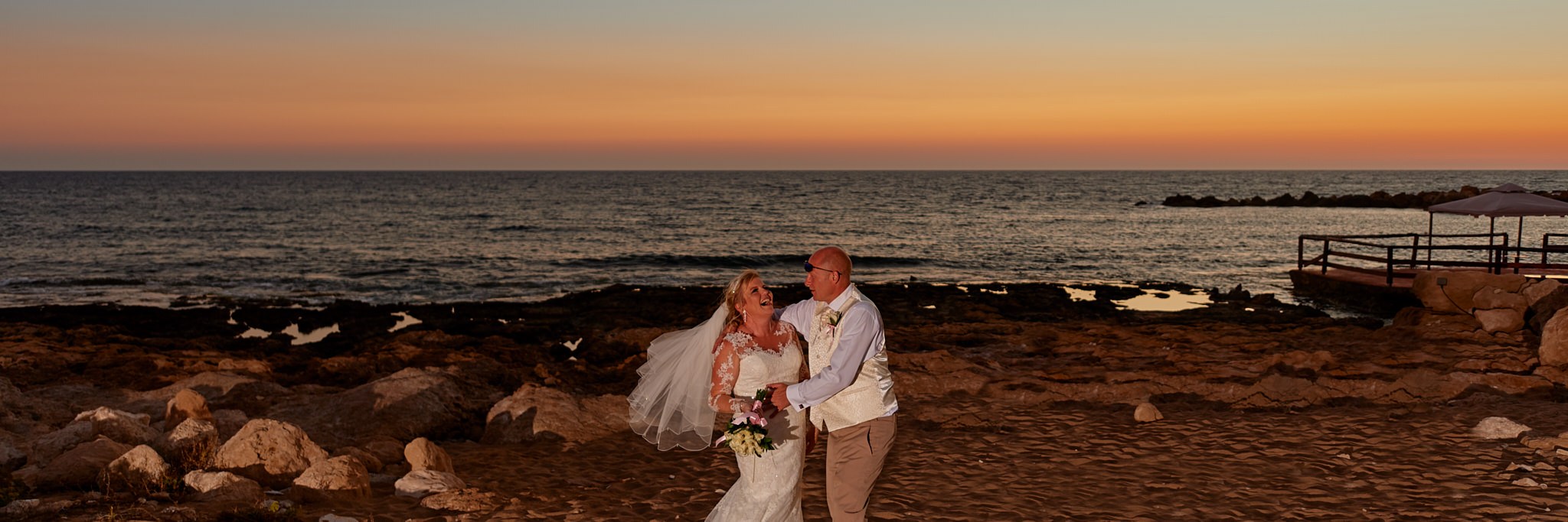 Wedding photography of Kara and Ian taken at The Sentido Cypria Bay, in Pafos, Cyprus by Richard King. September 2018. The wedding included a trip on a wedding bus. Wedding photography of Kara and Ian taken at The Sentido Cypria Bay, in Pafos, Cyprus by Richard King. September 2018. The wedding included a trip on a wedding bus.